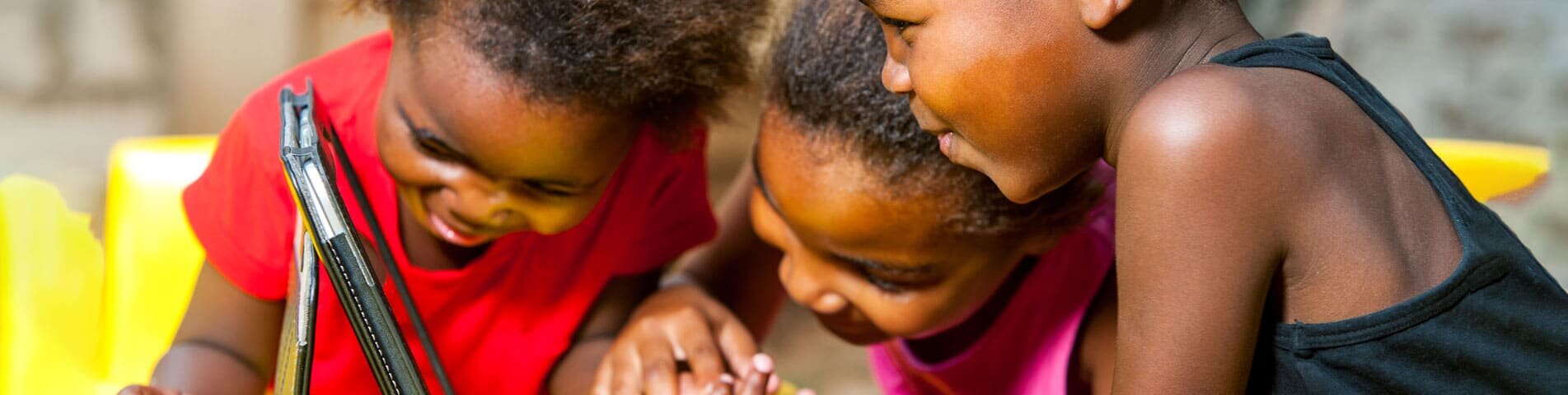 children looking at a computer